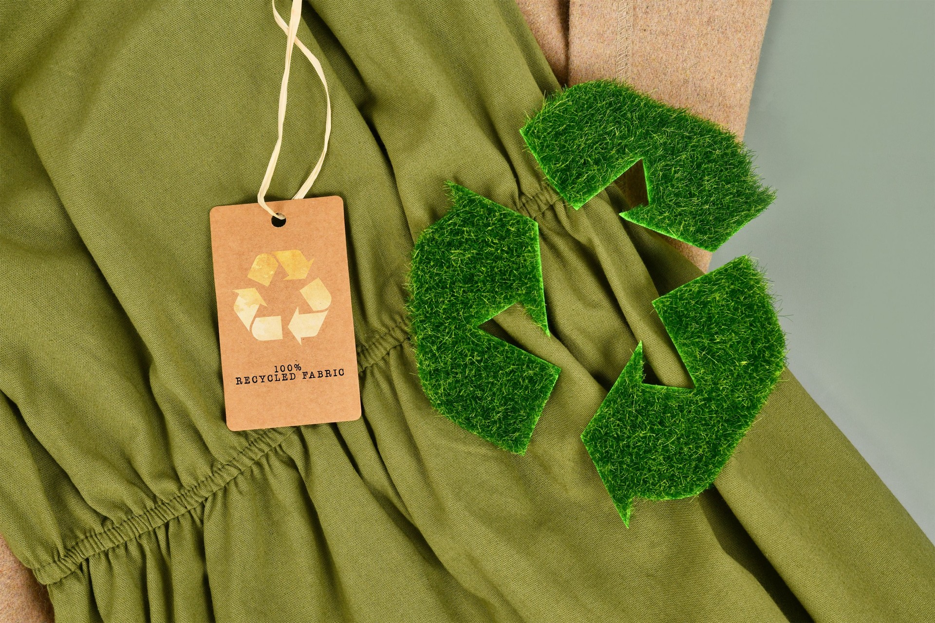 Green and beige eco friendly cotton fabric with 100 percent recycled label